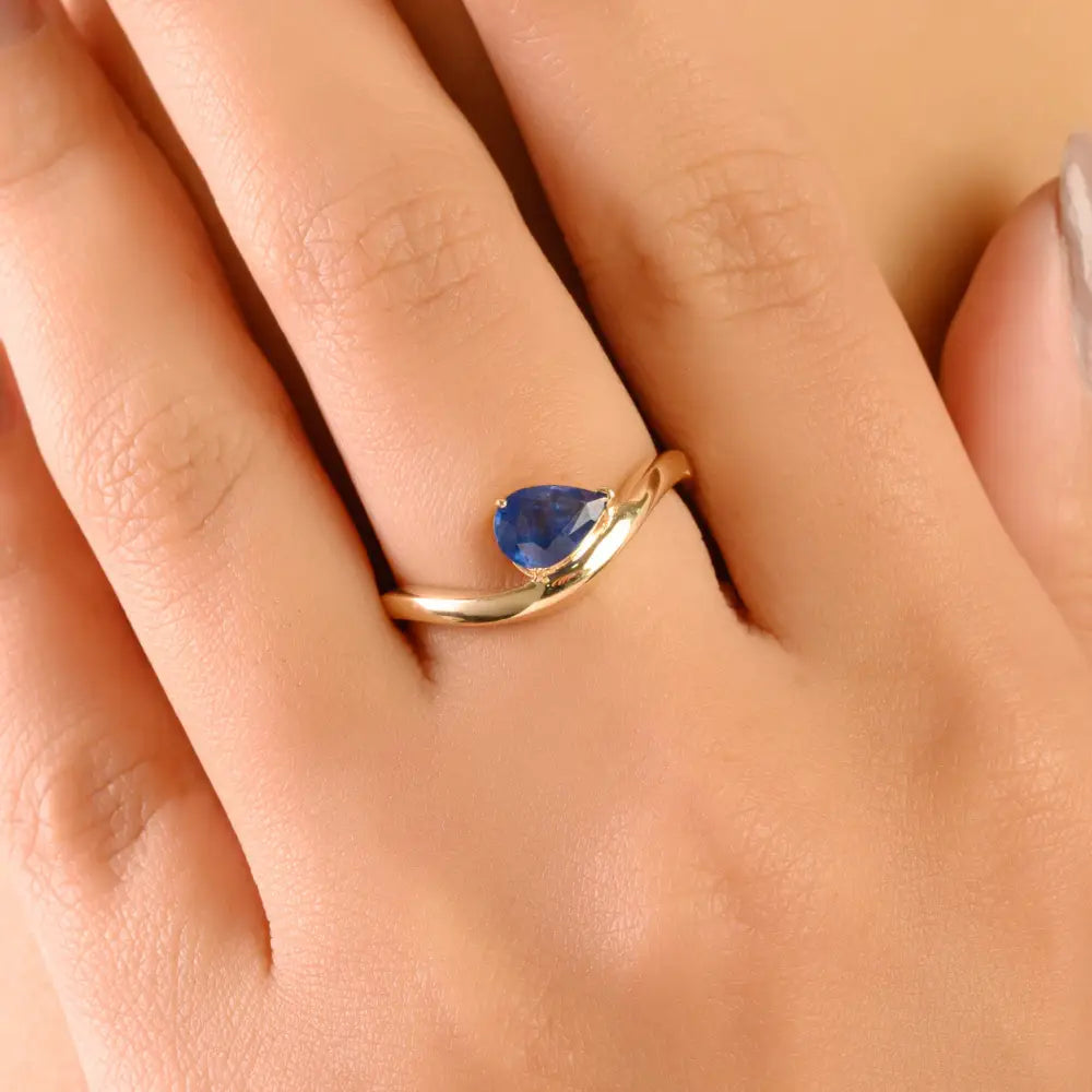 New Trending 14K Yellow Gold Blue Sapphire Curve Wavy Ring Latest Jewelry Collection