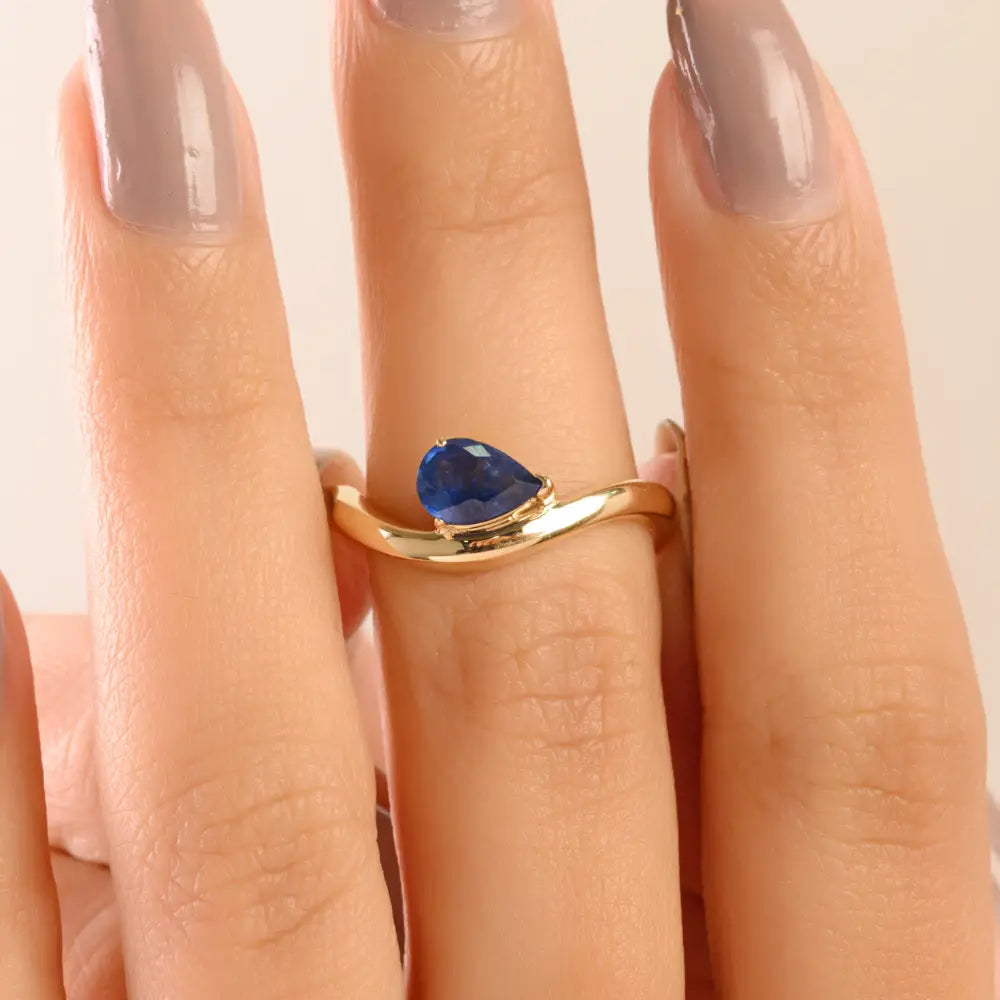 New Trending 14K Yellow Gold Blue Sapphire Curve Wavy Ring Latest Jewelry Collection