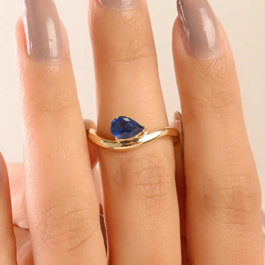 New Trending 14K Yellow Gold Blue Sapphire Curve Wavy Ring Latest Jewelry Collection