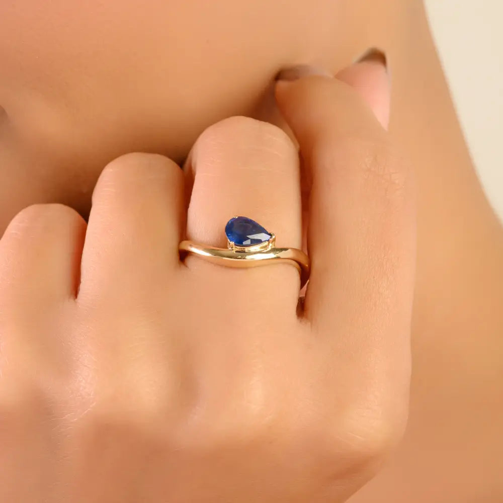 New Trending 14K Yellow Gold Blue Sapphire Curve Wavy Ring Latest Jewelry Collection