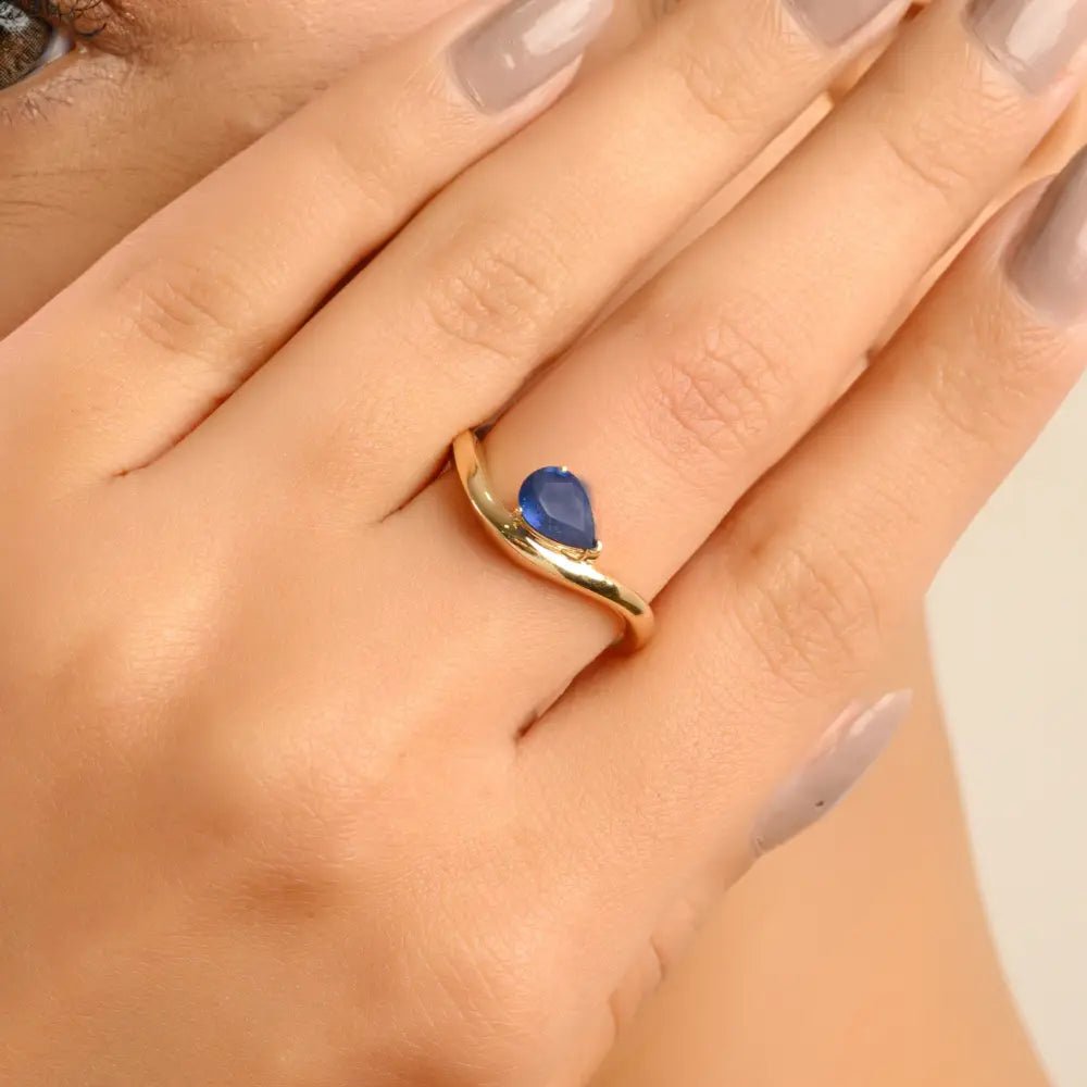 New Trending 14K Yellow Gold Blue Sapphire Curve Wavy Ring Latest Jewelry Collection