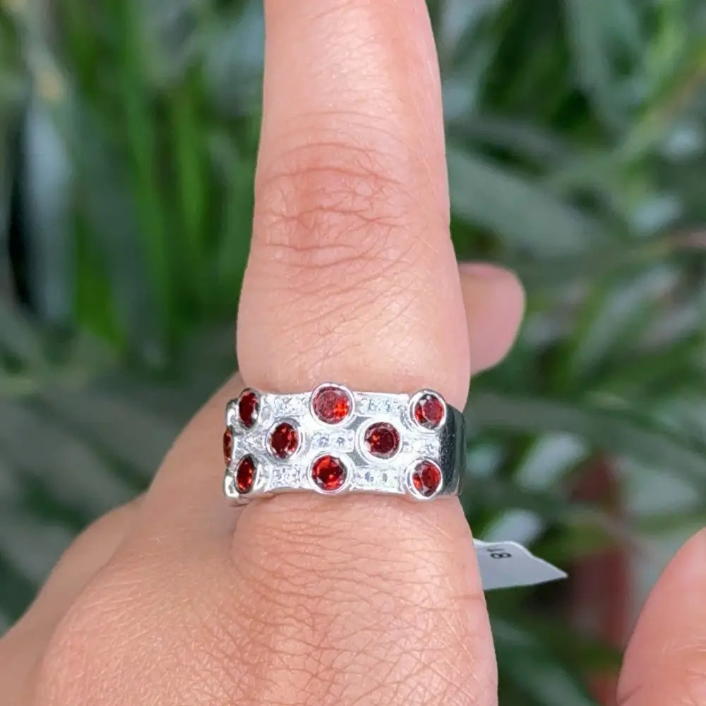 Explore Exquisite Jewelry Round Cut Garnet & American Diamond Wedding Band Ring Set In Bezel Setting