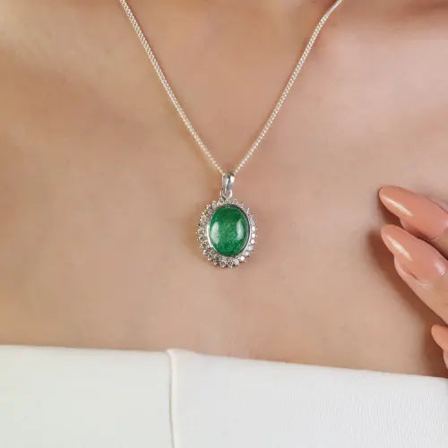 Trending Oval Shape Natural Emerald & Diamond May Birthstone Halo Pendant In 925 Silver