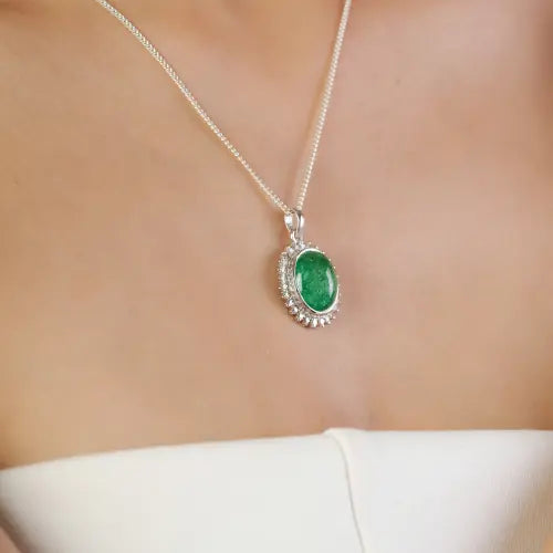 Trending Oval Shape Natural Emerald & Diamond May Birthstone Halo Pendant In 925 Silver