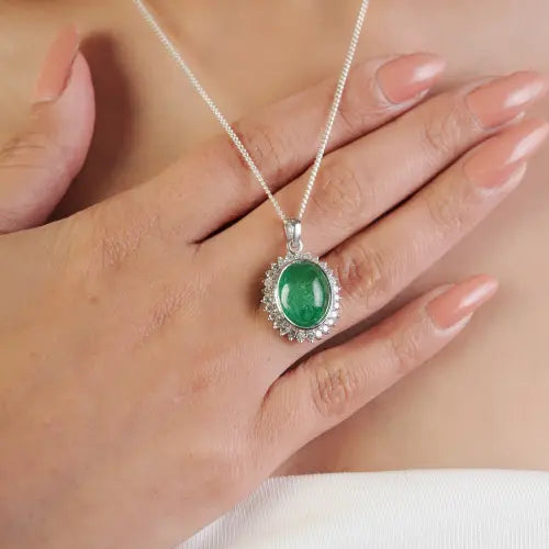 Trending Oval Shape Natural Emerald & Diamond May Birthstone Halo Pendant In 925 Silver