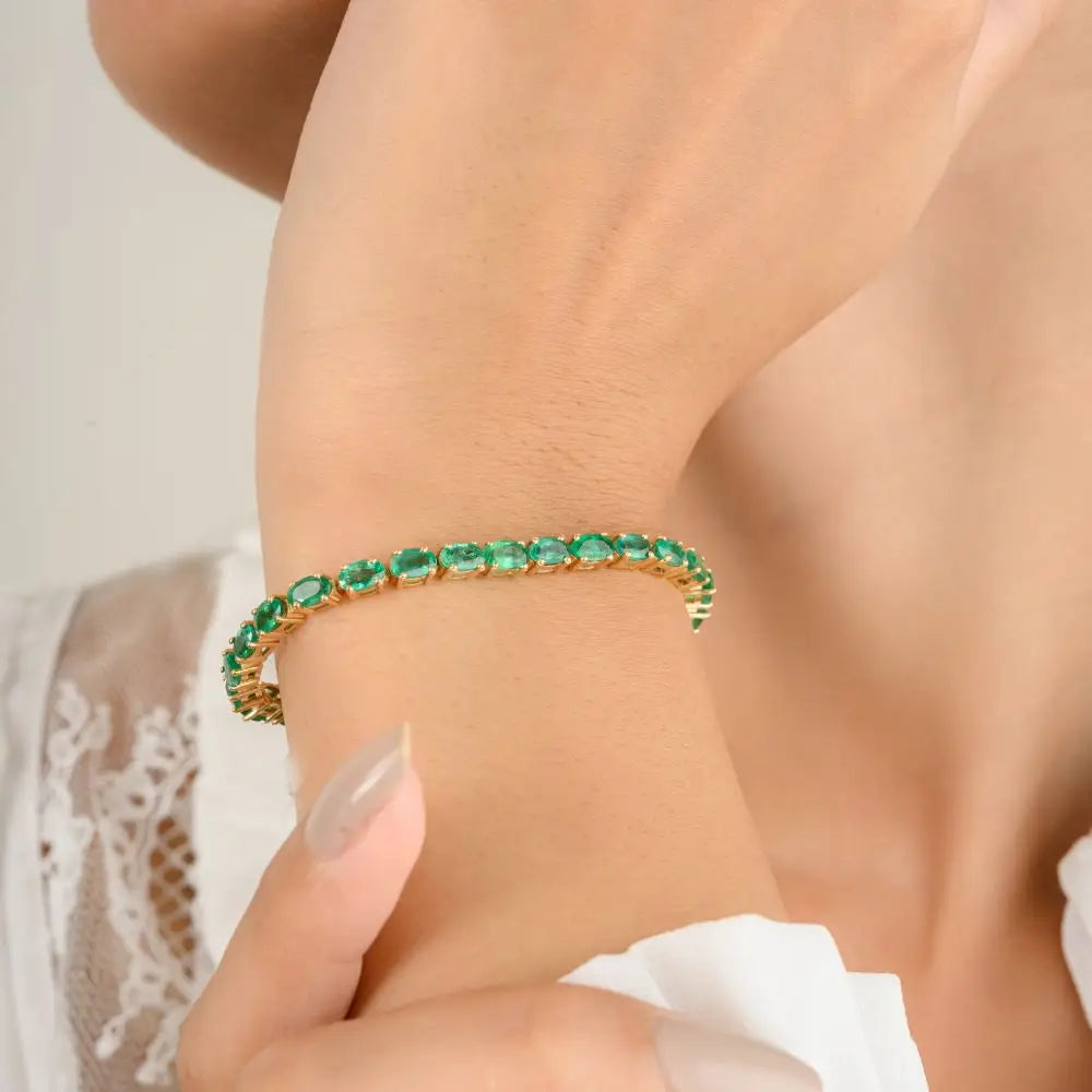 Oval Cut Emerald & Diamond Tennis Bracelet in 18k Yellow Gold