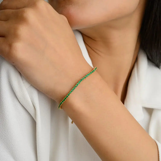 New Trendy Collection Of Natural Emerald & 18k Yellow Gold Sleek Tennis Bracelet