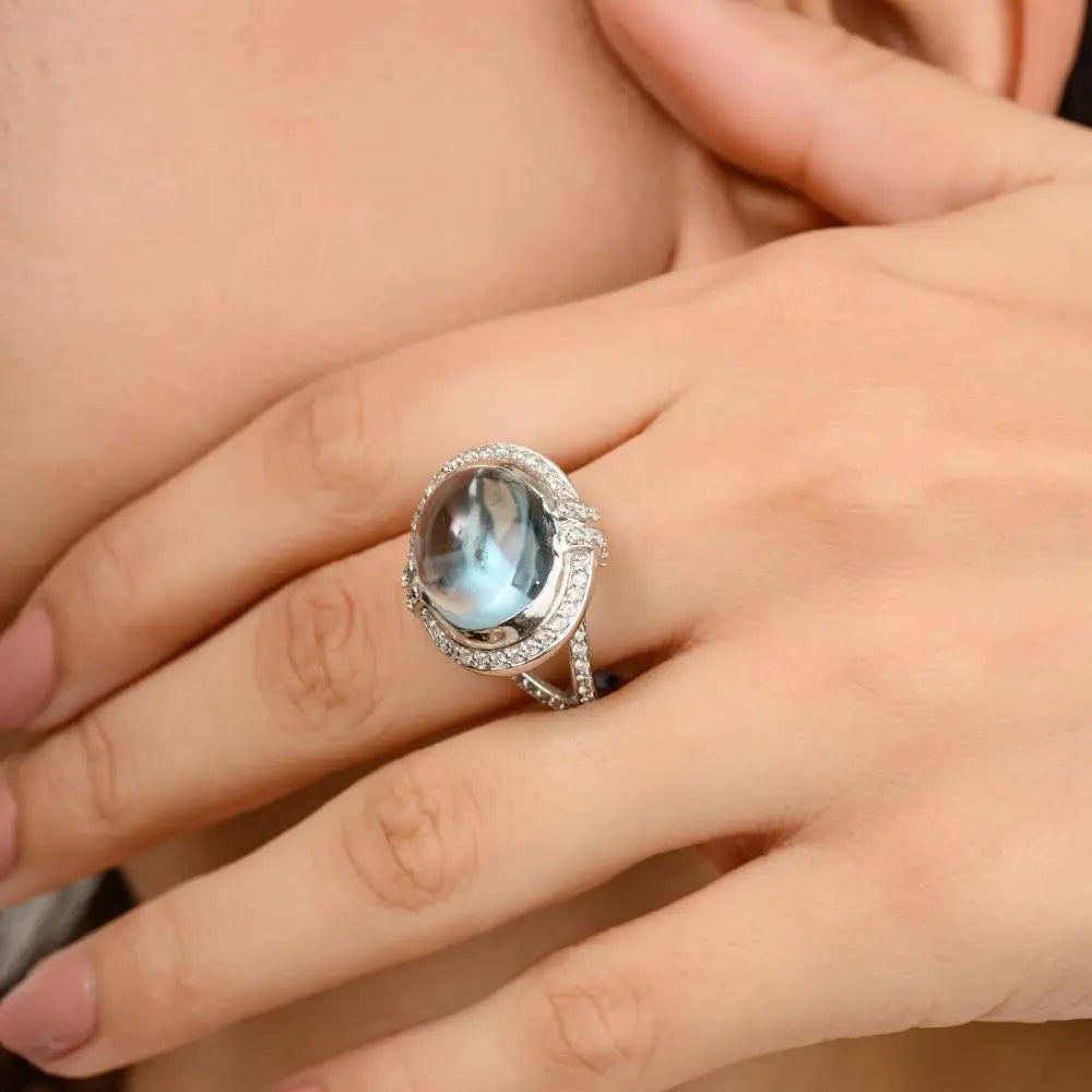 Natural Blue Topaz & Halo Diamond Regal Solitaire Ring in 18k White Gold